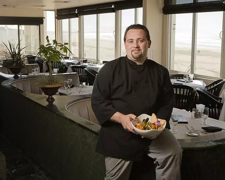 BY HIS BOOTSTRAPS : The Sea Venture’s Everett Walcott remembers his humble beginnings while creating delicious dishes. - PHOTO BY STEVE E. MILLER