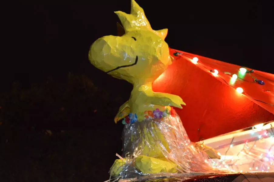 WOODSTOCK IN TRADE: Woodstock, fashioned out of papier-mache by the lovely and talented Dora Mountain, spearheads our float. - PHOTO BY ALEX ZUNIGA