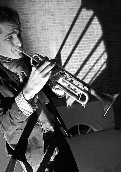 JAZZ HEROES : Trumpeter Dominick Farinacii (pictured) will join vocalist Inga Swearingen and vibraphonist Christian Tamburr at Cuesta College for an Aug. 12 concert. - PHOTO COURTESY OF DOMINICK FARINACII