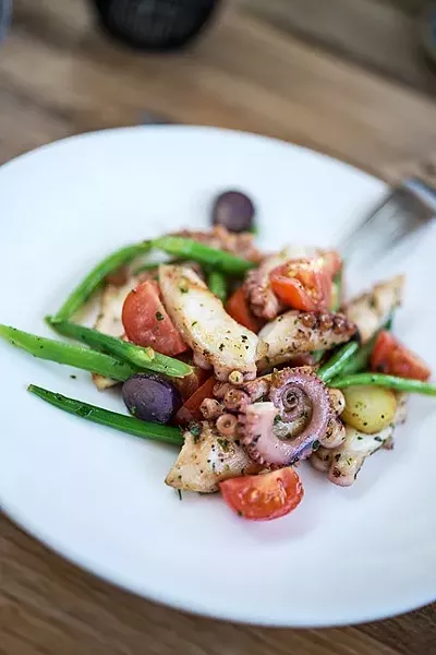 YES PLEASE!: S.Y. Kitchen serves a tongue-tingling warm octopus salad with taggiasca olives, potatoes, cherry tomatoes, and haricot verts. - PHOTOS BY ROB STARK, COURTESY OF S.Y. KITCHEN