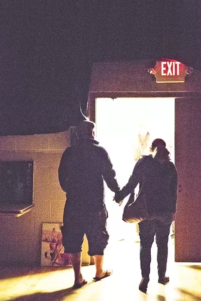 OUTTA HERE: Denied luchador Glen Starkey and his wife Anna leave in a huff! - PHOTO BY HENRY BRUINGTON
