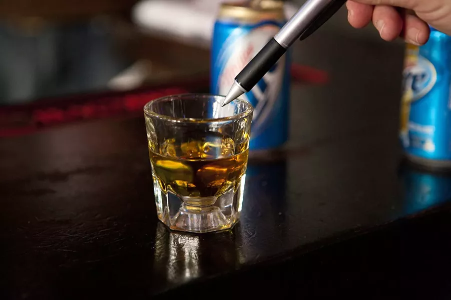 POISONED PEN! : Starkey dipped his pen into Jameson for inspiration, which doesn’t work, kids. Don’t try it at home! - PHOTO BY STEVE E. MILLER