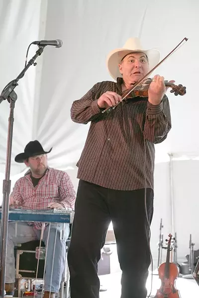 FUNNY BUT GOOD! : Fiddler Chisholm Wills makes funny faces when he plays, but he’s awesome as part of Kenny Kenning’s band. - PHOTO BY GLEN STARKEY