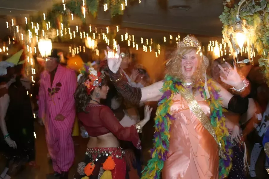 LAISSEZ LES BONS TEMPS ROULER! : Attendees at ARTS Obispo’s ARTI Gras event took to the dance floor at the Madonna Inn on Feb. 13. - PHOTO BY GLEN STARKEY