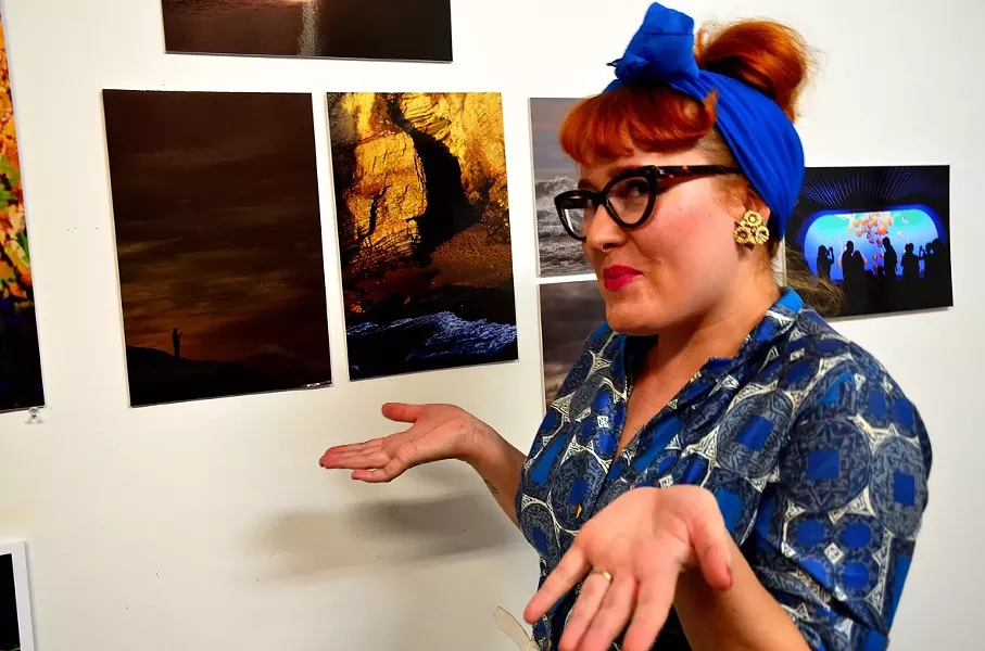 PICTURE PERFECT: New Times Flavor dame Hayley Thomas points out the finer points of Larry Letters’ photographs. We both agree: They are all rectangles. - PHOTO BY JESSICA PEÑA