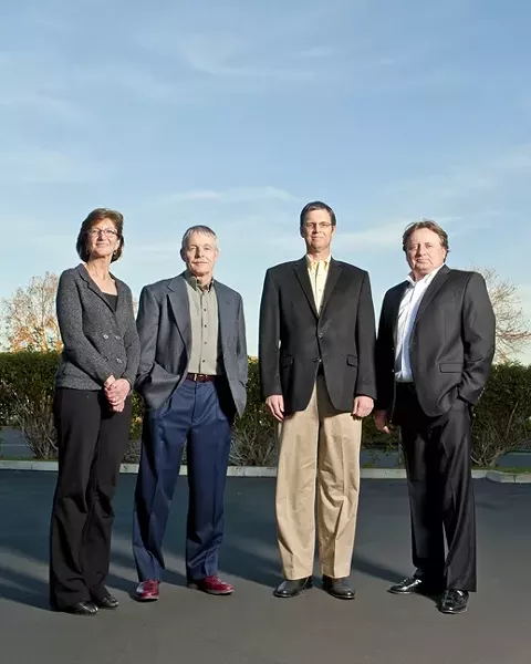 KCRF’S CORE: Sue Anderson, Steve Anderson, Patrick Kerans, and Frank Kalman drive the Kids’ Cancer Research Foundation as the group seeks out promising clinical - trials to battle children’s cancer. Steve Anderson, Kerans, and Kalman’s daughter Calli have all survived battles with cancer. - PHOTO BY STEVE E. MILLER