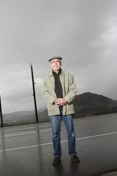 WIND WATCHER: Paul Allen is a retired county wind expert. He’s standing beside one of several wind stations that don’t factor into PG&E’s emergency plans. - PHOTOS BY STEVE E. MILLER