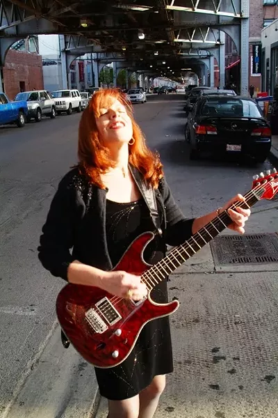 BLOWIN’ IN THE FROM THE WINDY CITY : Chi-town guitarist-vocalist Liz Mandeville and the Blue Points play on April 25 at the SLO Vets Hall. - PHOTO COURTESY OF LIZ MANDEVILLE