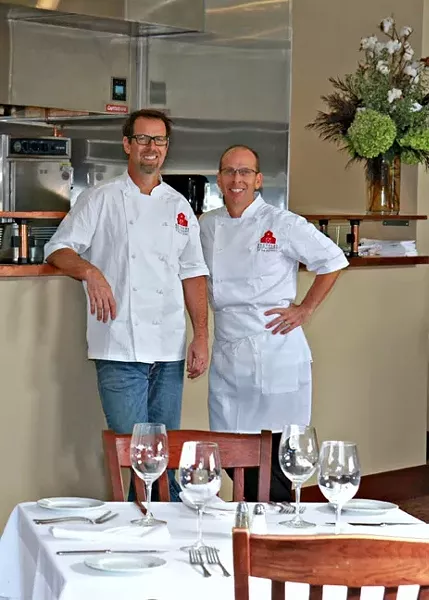 KITCHEN WITH A VIEW: Chefs Jeff and Matt Nichols run the new Brothers Restaurant at the Red Barn in Santa Ynez, featuring a kitchen overlooking the dining room. - PHOTO BY TENLEY FOHL