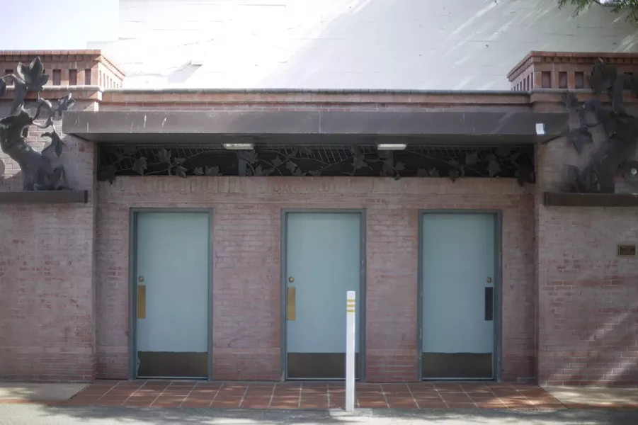 HA-HA! FAKED YOU OUT!: SOFCO members were angry at tax dollars building these public restrooms across from Big Sky Café, but find it hilarious when they “see some tourist waddling over there, squirming to take a whiz,” only to find them closed. - PHOTO BY GLEN STARKEY