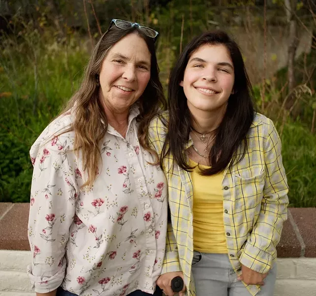 LOOKING UP : Doctors thought Ivy Alvarado (right) would never even regain consciousness after her heart suddenly failed but now she’s regaining motor skills, speech, and her sense of humor. Her mother Melinda Alvarado (left) faces staggering medical bills. - PHOTO BY STEVE E. MILLER