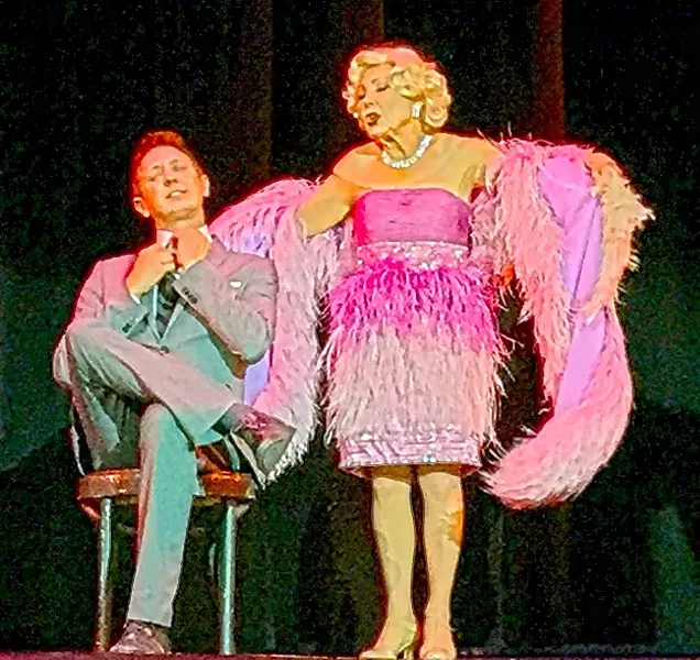 WHOSE DADDY?: Dave Hovde is serenaded by feathered and bejeweled Judy, senior Follie, to “My Heart Belongs to Daddy.” - PHOTO BY REBECCA LUCAS