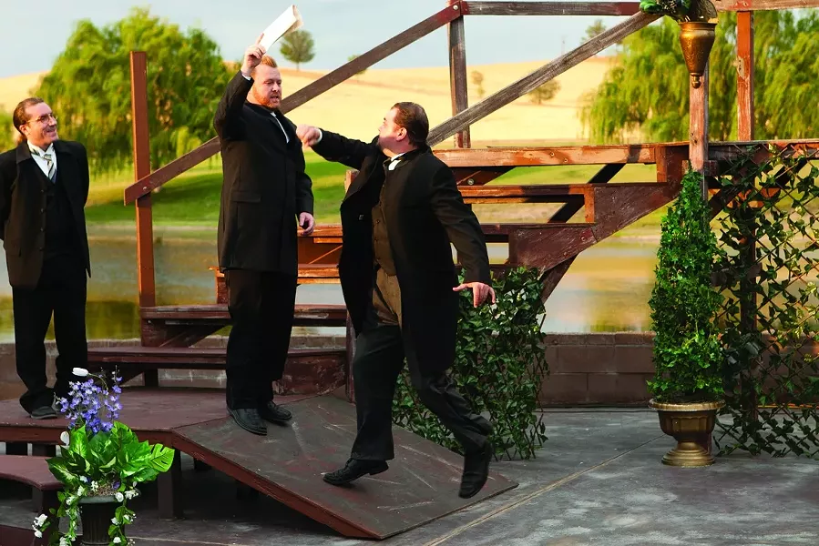 OH NO HE DIDN’T… : The King of Navarre (Corey Schonauer, center) taunts his courtier Berowne (Matthew Hanson, right) as fellow courtier Dumaine (Charles Hayek, left) looks smugly on. - PHOTO BY STEVE E. MILLER