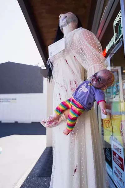 WOMAN IN WHITE: Coast Union High School student Ana Bibiano's scarecrow, 'La Llorona,' recreates the Mexican legend about a beautiful woman who drowns children for the love of a man. It won first place for Most Likely to Scare Crows (or People). Agreed! - PHOTO BY KAORI FUNAHASHI