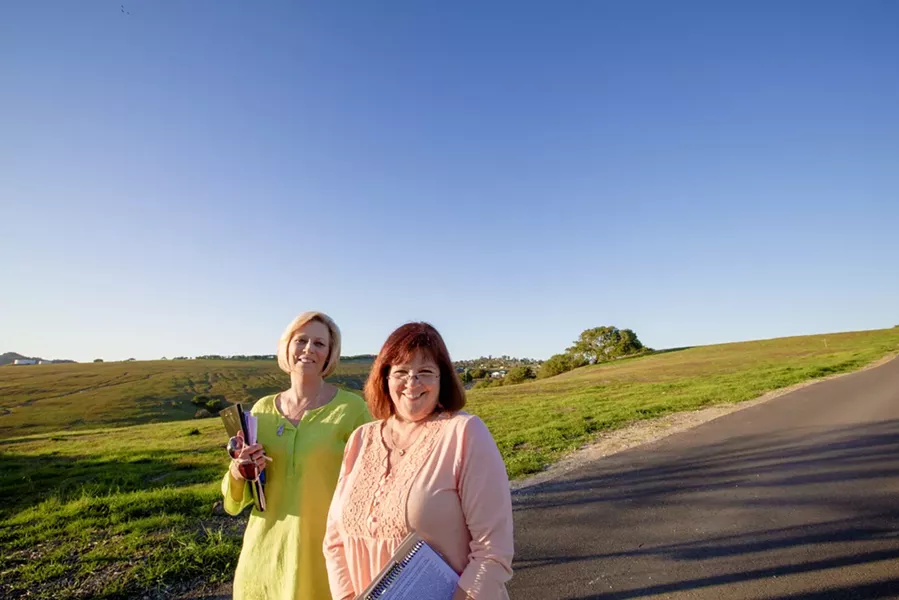 SIGNATURE HUNTERS: Save Price Canyon members Marcia Guthrie (left) and Susan Testa (right) are part of the volunteer team gathering signatures for the group’s ballot initiative, which seeks to preempt overdevelopment in Price Canyon. - PHOTO BY HENRY BRUINGTON