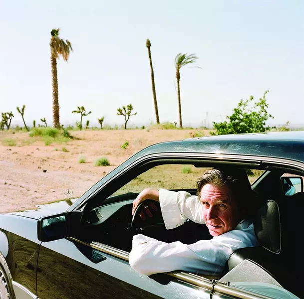 MUSICIAN, POET, ACTOR: Triple threat John Doe will lead X, his 36-year-old punk act, through its paces on Dec. 12 at SLO Brew. - PHOTO COURTESY OF JOHN DOE