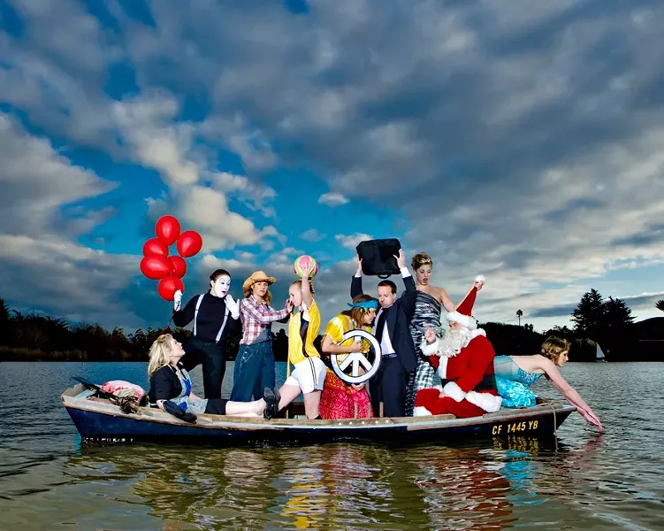 ALL IN THE SAME BOAT : (DOUBLE TAKE) (l-r) Christy Heron (‘50s housewife), Amy Asman (mime), Chloe Rucker (farmer), Ellie Cattaneo (soccer player), Kristina Bennett (hippie), Brent Staple (businessman), Dora Mountain (beauty queen), Ed Connolly (Santa), and Heather Weltner (mermaid). Art director: Ashley Schwellenbach. Hair and makeup by Shelby Hood. Boat (the Mudhen) courtesy of Glen Starkey. - PHOTO BY STEVE E. MILLER