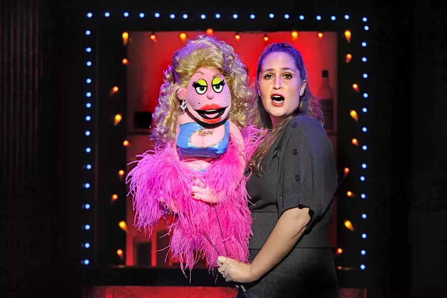 MAN’S BEST FRIEND : Lucy the Slut, manned by Jacqueline Grabois, bed hops through the fictional neighborhood of Avenue Q. - PHOTO COURTESY OF AVENUE Q