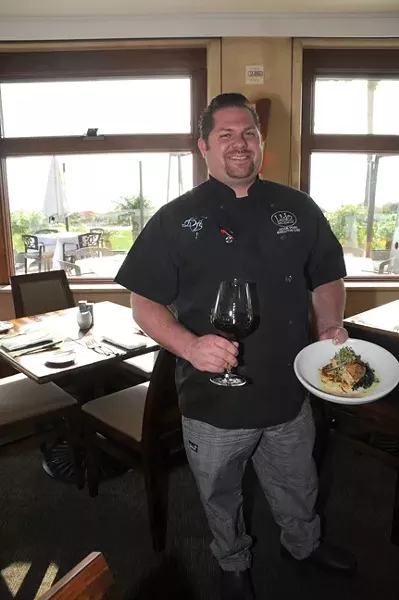 ON THE MENU: Lido chef Jacob Moss, a local wine aficionado, presents his apple and chorizo stuffed sole with braised kale, celery root latke, and apple - cider beurre blanc. - PHOTO BY DAN HARDESTY