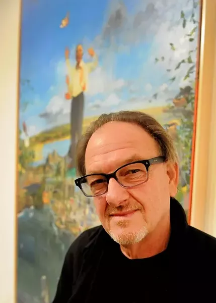 PORTRAIT OF THE ARTIST: Tom Wudl is pictured here in front of his incredible painting 'The Birth of Jan Van Eyck and the Extent of His Influence on the Art of Painting, for a Period of 600 Years.' I’d include a photo of the painting, but you should really just go see it for yourself. - PHOTO BY JAY THOMPSON