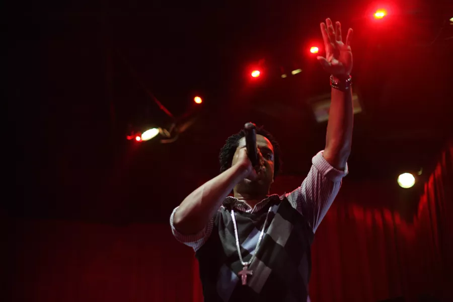 EMCEE!: Brotha “C” kept the night moving along by performing karaoke in between rounds. - PHOTO BY ANNA STARKEY