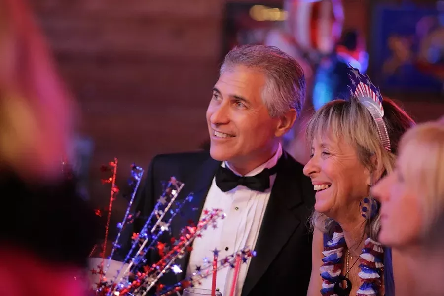 INAUGURAL BALL : Mr. Emmer and a friend share a moment at the ball. - PHOTO BY STEVE E. MILLER