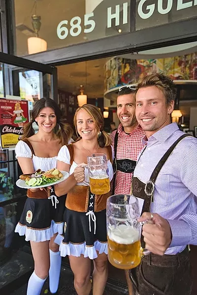 EAT, DRINK, OOMPAH: From left, Kreuzberg Oktober Fest co-organizers Freya Wilkerson, Ali Zikratch, and owners James Whitaker and Chris Tarcon. The crew will host an all-day celebration of beer, food, and German music this Oct. 17. - PHOTO BY KAORI FUNAHASHI