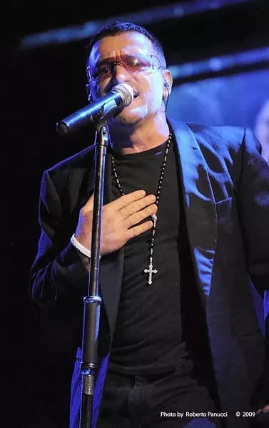 YOU LOOK SO BEAUTIFUL TONIGHT: Only their mothers can tell them apart; pictured is Bono stand-in Pavel Sfera from Vegas U2. - PHOTO COURTESY OF VEGAS U2