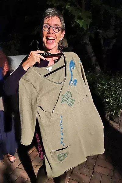 ALL SEWN UP: Ragtime member Liz Rhoads Cordoba shows off her finished Alabama Chanin-technique coffee dress at Yarns … at the Adobe. - PHOTO BY GLEN STARKEY