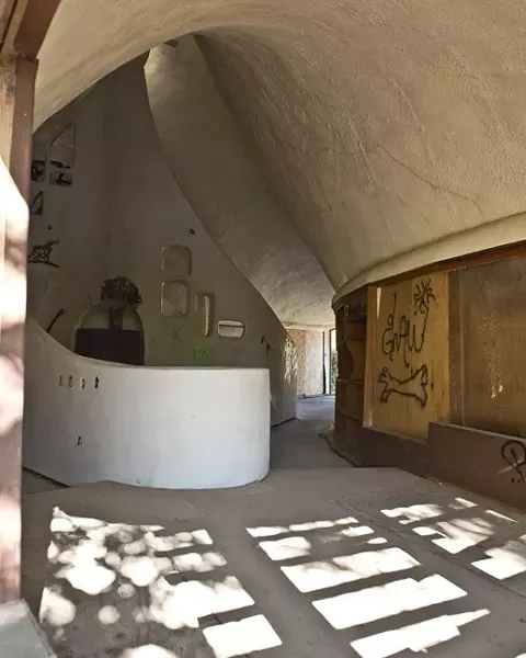THE SHELL OF A HOUSE: Third-year history major Ryan Kadlec analyzes Cal Poly's “Shell House”—vandalized by some, treasured by others—as an example of the changing reactions to public art. - PHOTO BY STEVE E. MILLER