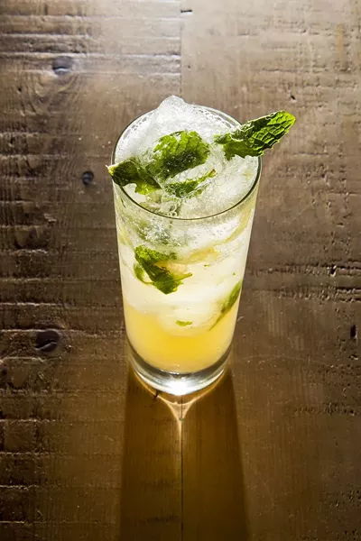 YOU’RE MORE THAN WELCOME: The Welcome Cocktail, a creation of Eric Hunter at the Granada Bistro, is essentially a vodka drink, but with touches of mint and grape. - PHOTO BY STEVE E. MILLER