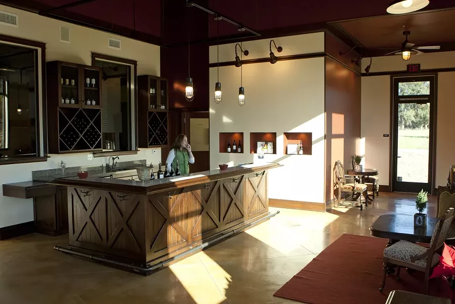 BRIGHT WINES : The tasting room is large, bright, and inviting with interior decoration designed by Mrs. Stolo.