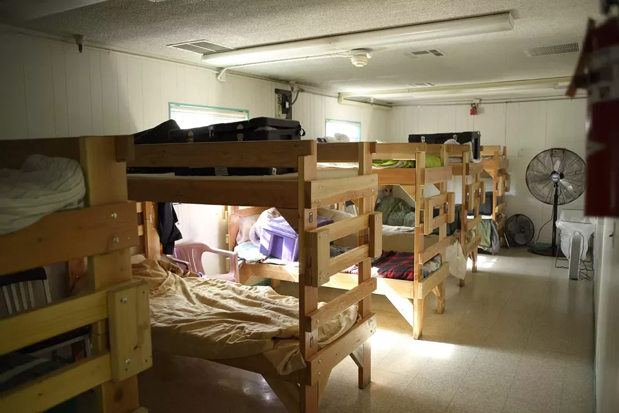 NO HOME OF THEIR OWN : Some SLO schoolchildren who are experiencing homelessness do some homework and eat their dinner at the Maxine Lewis Shelter, then move to a local church to sleep. - PHOTO BY STEVE E. MILLER