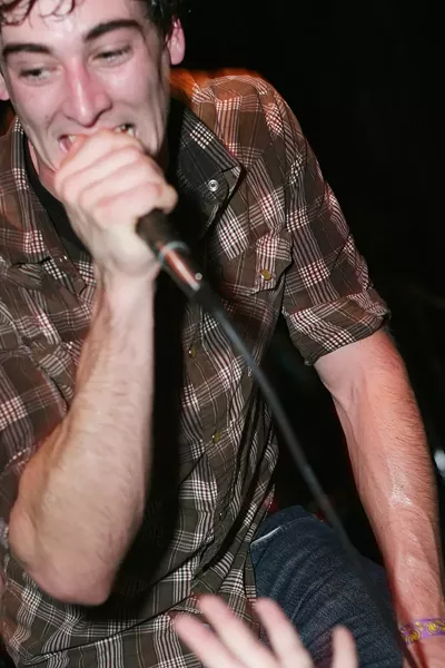 THE KIDS ARE ALRIGHT! : Travis Hawley of PK ignites the crowd at the band’s last Downtown Brew gig, where they appear again with The Mighty Fine, Picture Atlantic, and Please Do Not Fight on April 2. - PHOTO BY GLEN STARKEY
