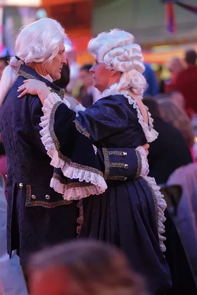 INAUGURAL BALL : Marilyn Armstrong (as Martha Washington) dances with George Washington. - PHOTO BY STEVE E. MILLER