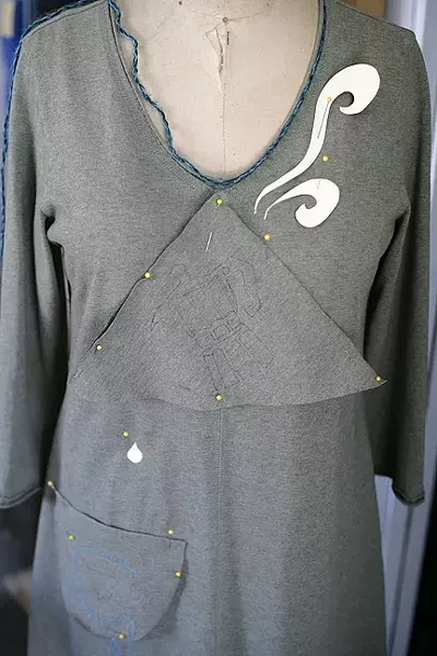 WORK IN PROGRESS: When done, this dress will feature a coffee pot pouring into a cup on a pocket, complete with rising steam, all utilizing the “Alabama Chanin” technique. - PHOTO BY GLEN STARKEY