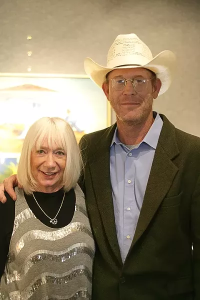IN THE VAULT! : Vault Gallery owner Laylon shares an embrace with her featured artist, Mark Beck, at the Saturday opening reception. - PHOTO BY GLEN STARKEY