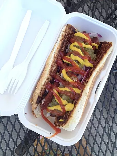 DELI DOG: Shell Beach Liquor & Deli may be a convenient stop for coastal booze and jerky, but the old-school hangout also harbors juicy, Hebrew National franks made to order. - PHOTO BY HAYLEY THOMAS