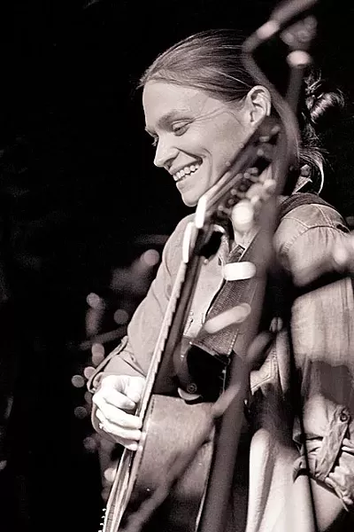 PICKER AND GRINNER: Amber Cross of Austin, Texas, will raise the roof of the Los Osos Red Barn this Sept. 5. - PHOTO BY REN NICKSON