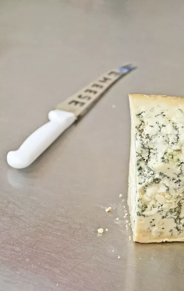 BLOCK HEAD: Blue Stilton is one of many artisan cheeses the Santa Ynez shop is selling. - PHOTO BY CAMILLIA LANHAM