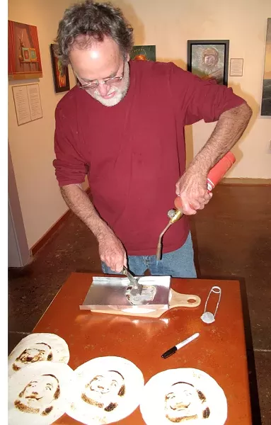 YUMMY, SURREALISM : Mark Bryan cooks up some Salvador Dali tortillas at the Steynberg Gallery. - PHOTO BY PETER STEYNBERG