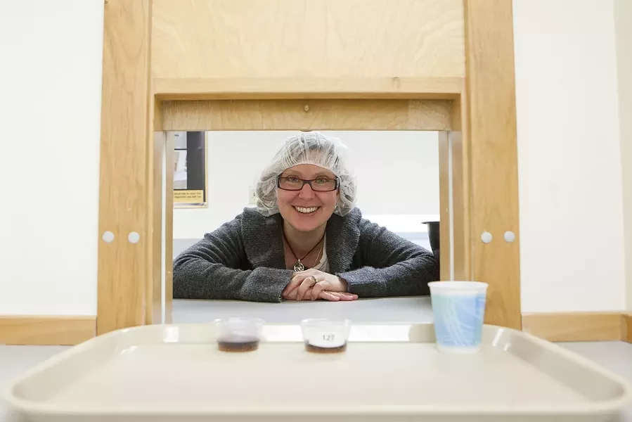ARE YOU BEING SERVED?: Food science and nutrition associate professor Dr. Amy Lammert offers up some samples in Cal Poly’s food processing laboratory. - PHOTO BY STEVE E. MILLER