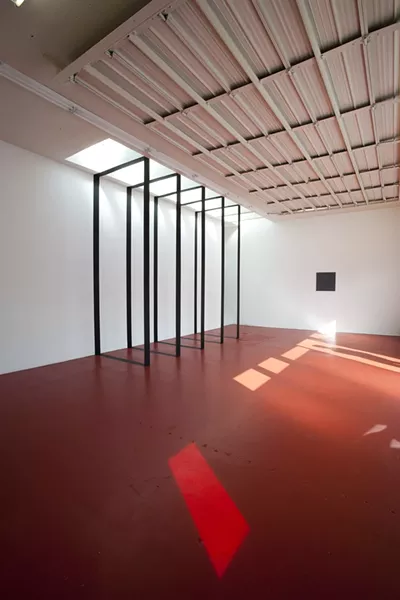 LIGHT AND SPACE : Michael James Armstrong’s piece 5 Black Rectangles was built specifically for Compact Gallery’s unusually situated skylight. Armstrong was one of four artists from San Diego’s Ice Gallery who created the site-specific exhibition “Ice Gallery North” at Compact. - PHOTO BY STEVE E. MILLER