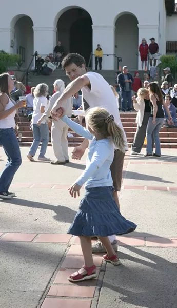 FATHER-DAUGHTER DANCE OFF! : A father and daughter show the crowd how it’s done. - PHOTO BY GLEN STARKEY
