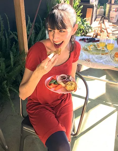 SHE LIKES TO EAT: SLO Tribune's Ticket Editor Sarah Daly infiltrates brunch, no doubt gathering intel for the other side. She makes a mean basket of corn muffins. - PHOTO BY HAYLEY THOMAS