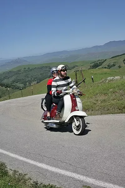 PREFUMO CANYON PERFECTION: Curtis and Jesse Campbell ride their vintage Lambretta scooter through the hills of SLO County. - PHOTO BY GLEN STARKEY