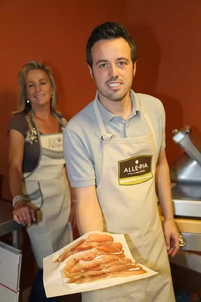 MADE WITH LOVE: Alex Pellini of Alle-Pia Fine Cured Meats spends his days mixing spices, aging pork, and ensuring quality control at his uncle’s Atascadero cured meats processing facility and Emporio. - PHOTO BY DYLAN HONEA-BAUMANN