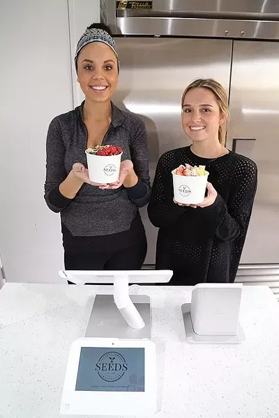 GREEN INTERVENTION : Seeds associates Candice Jardine and Hanna Stowell serve up delicious acai bowls, parfaits, and green juices designed to boost your health and your spirits. - PHOTO BY DYLAN HONEA-BAUMANN