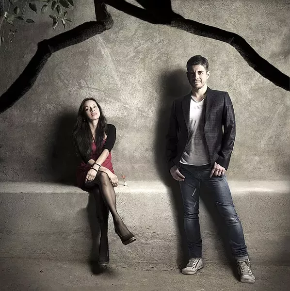 FUMAR CALIENTE : Smoking hot Mexican acoustic guitar duo Rodrigo y Gabriela makes their Central Coast debut May 27 at the Avila Beach Resort. - PHOTO COURTESY OF RODRIGO Y GABRIELA