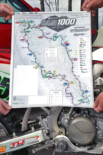 PLAN OF ATTACK: Long before race day, the team of friends devised an intricate plan of who would race what portion of the course and which car would link up with which rider at any given stop. - PHOTO COURTESY OF COASTRIDERS POWERSPORTS